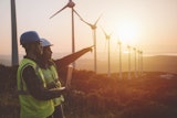 Engineering team working in a wind turbine farm.